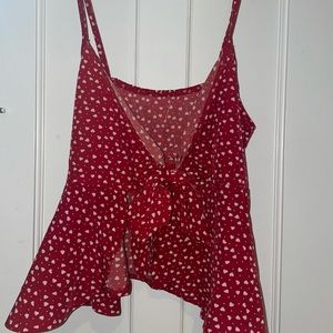 red tank top with tying knot in front